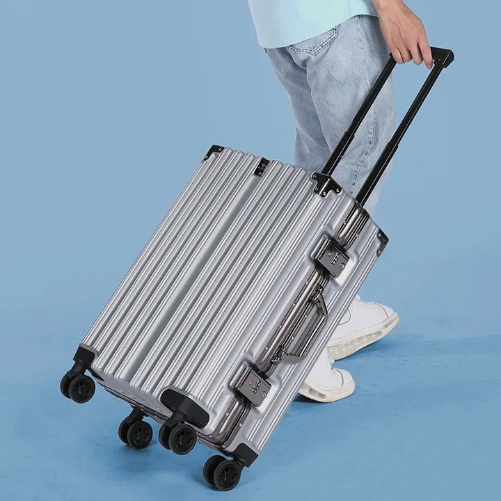 Compact hard shell carry-on suitcase, unisex design, aluminum frame, secure lock, and spinner wheels.