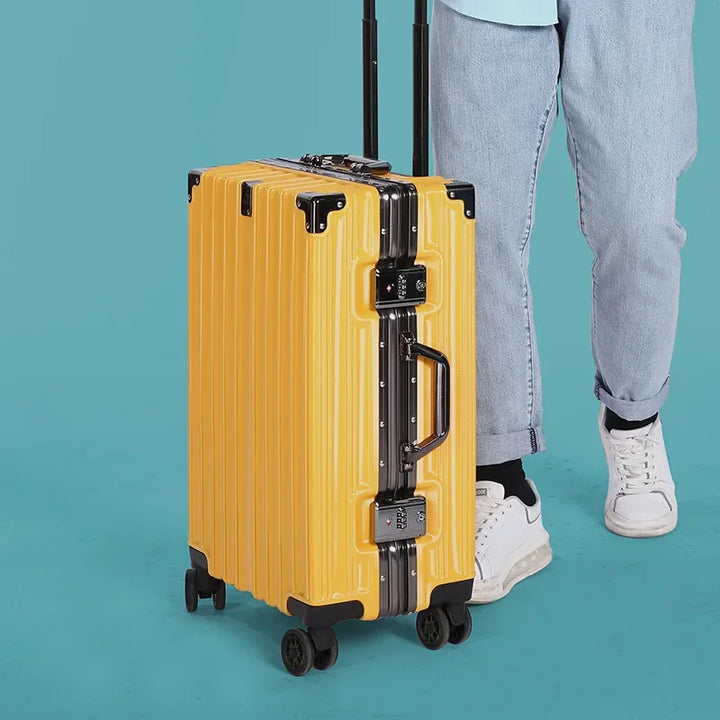 Robust checked baggage: unisex hard shell suitcase, aluminum frame, secure lock, and smooth spinner wheels.