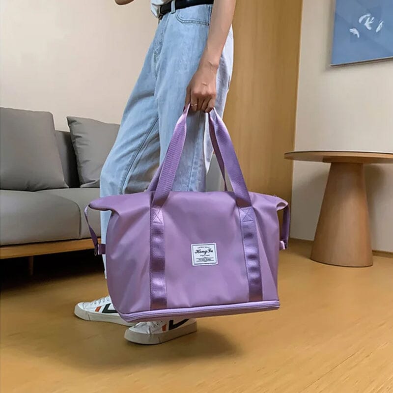 Modern travel duffel bag made from water-resistant material, ideal for all weather