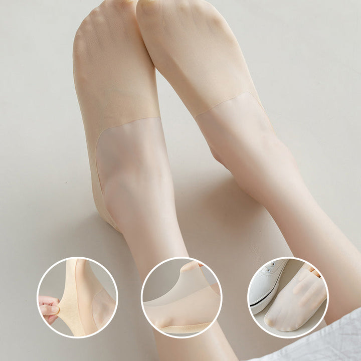 Detailed image of the silicone heel grip inside the invisible no-show socks, preventing slips