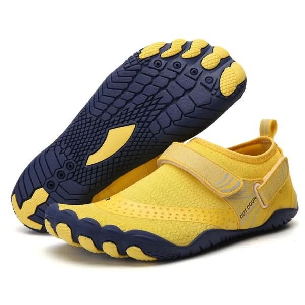 Pair of lightweight unisex barefoot water shoes. Quick-dry for beach, swim, & outdoor hikes, ensuring comfort & stability.