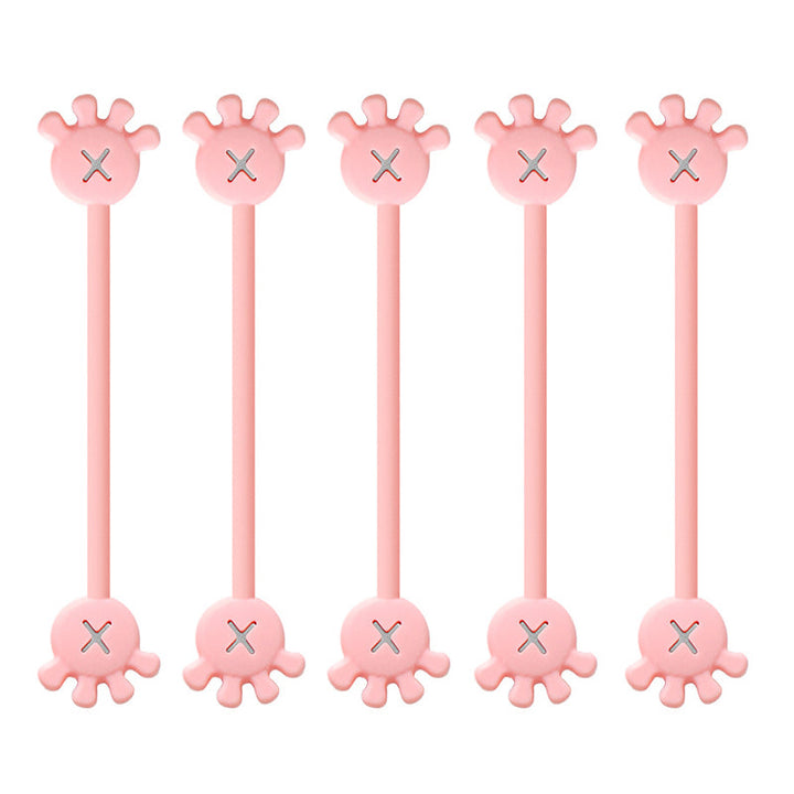 Side view of a magnetic silicone cable organizer clip, highlighting its compact and unobtrusive profile.