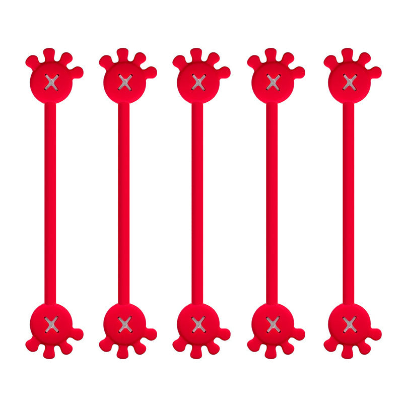 Magnetic silicone cable organizer clip in pink, a vibrant desk accessory for stylish cord management.