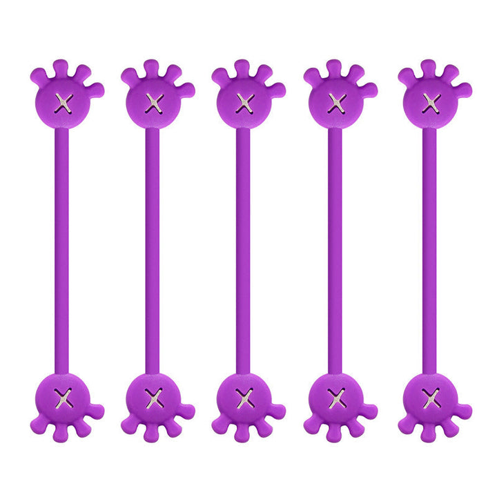 Magnetic silicone cable organizer clip, neutral beige, for understated and effective cord management.