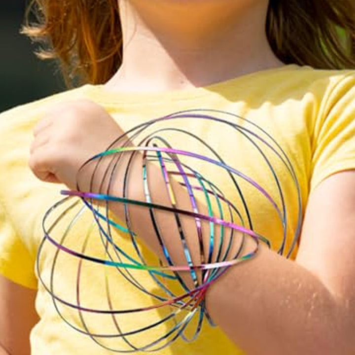 Unisex metal spinning spiral fidget bracelet for stress & anxiety relief, shown on a wrist.