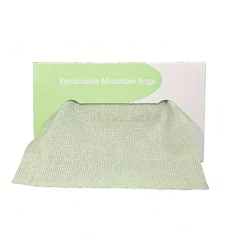 Set of absorbent microfiber cloths on a wooden kitchen table.