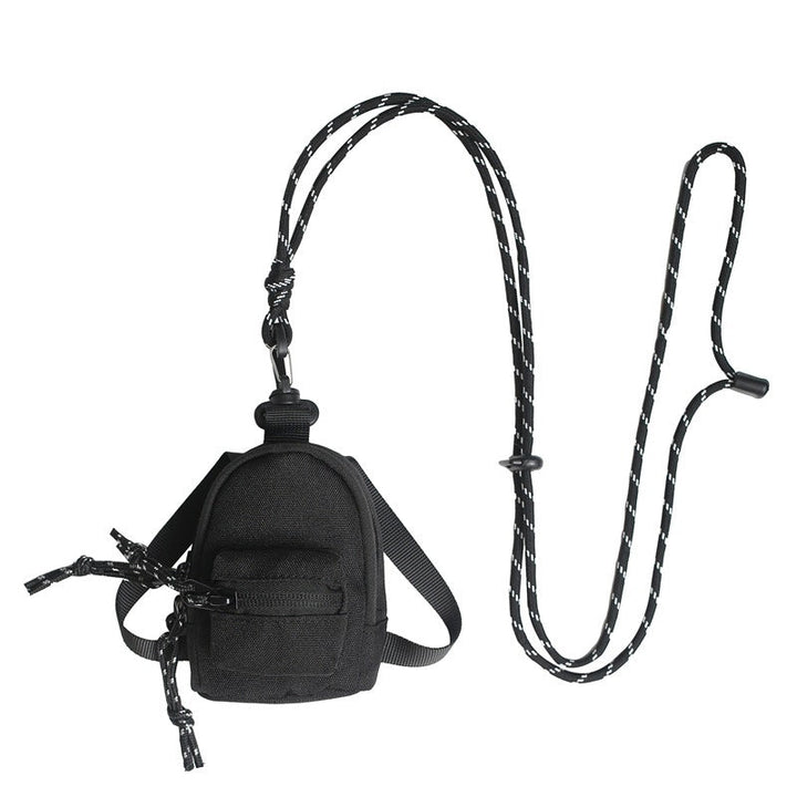 Water-resistant oxford cloth mini bag, versatile for any outing.