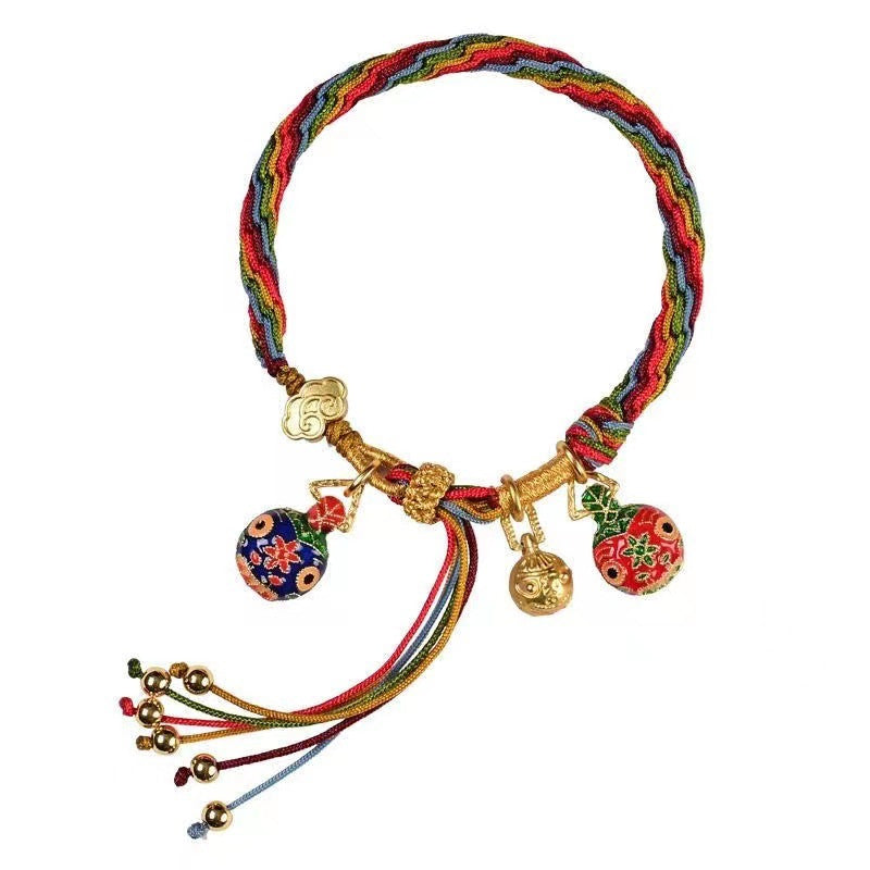 Unisex ethnic cord bracelet featuring a powerful mythical reincarnation symbol, meaningful gift