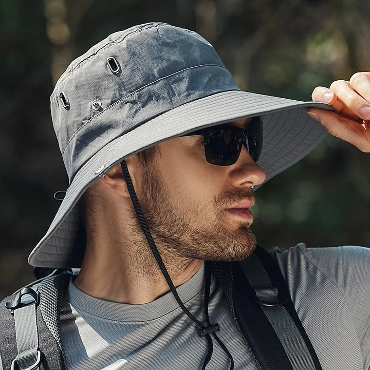 Unisex summer bucket hat with extra wide brim, offering ultimate sun protection for outdoor adventures
