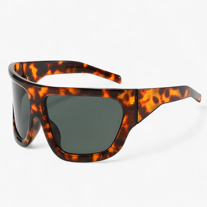 Statement Y2K steampunk sunglasses, oversized wraparound design for trendy streetwear fashion.
