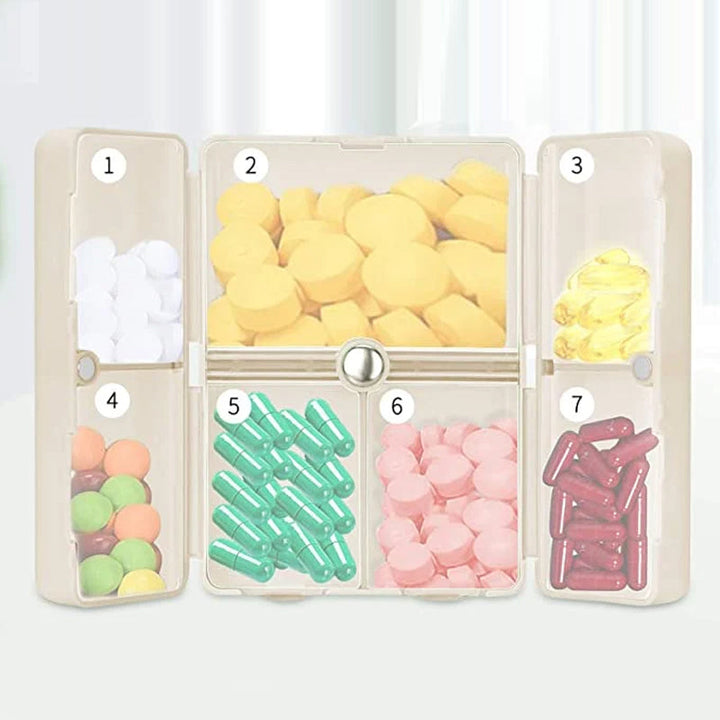 Compact 7-day pill box with magnetic closure, perfect for organizing vitamins & medication on-the-go