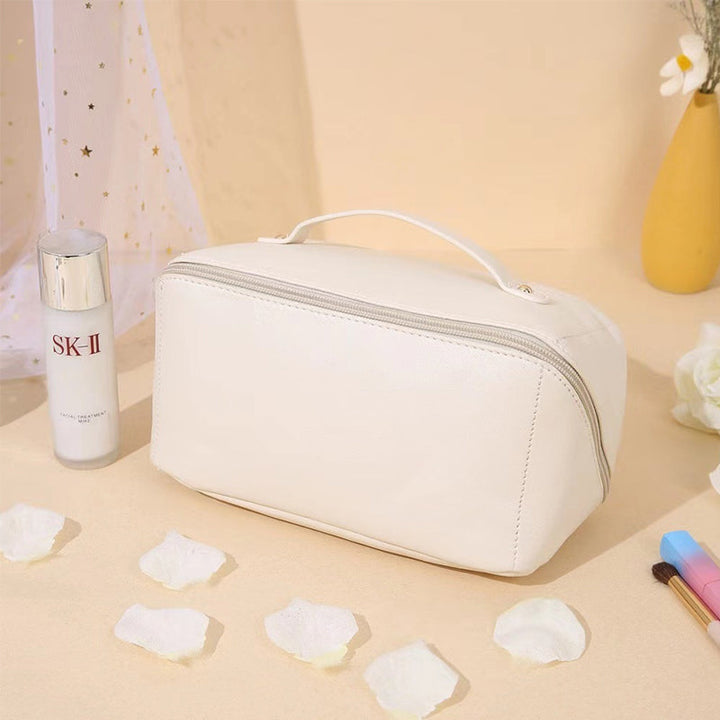 Side profile of the unisex travel cosmetic organizer, highlighting its slim and portable design.