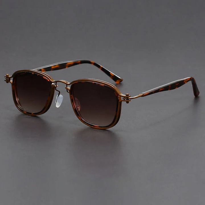 Unisex rectangular UV400 sunglasses protecting eyes with a sleek black frame, lightweight, scratch resistant eyewear.