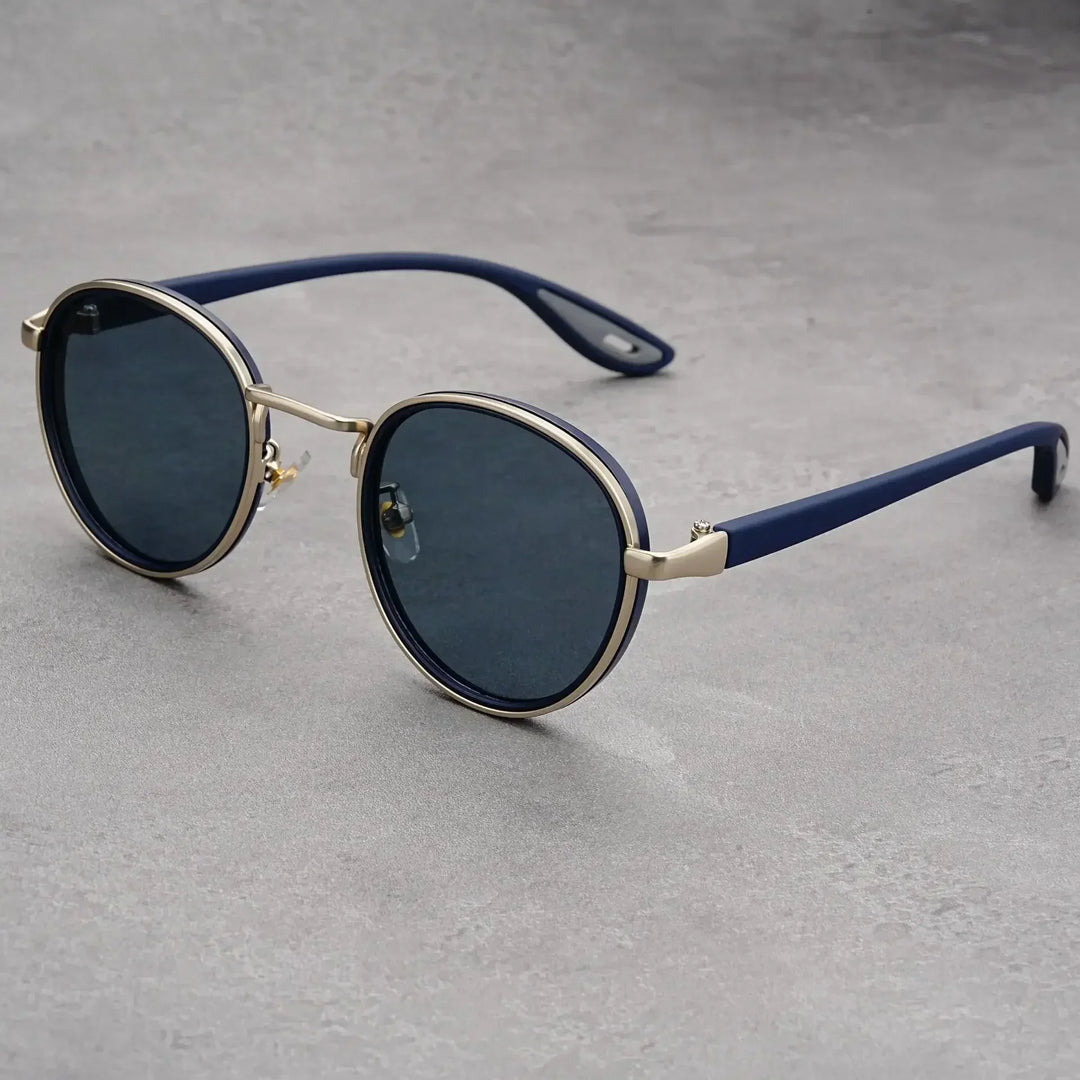 Retro round metal sunglasses for men and women, featuring gradient UV protection lenses