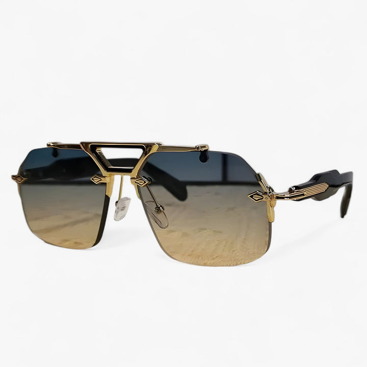 Lightweight unisex rimless sunglasses. Gray mirrored UV400 lenses and stylish gold metal accents.