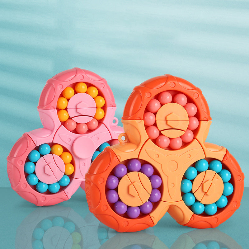 Adult enjoying a rotating magic bean puzzle, a relaxing fidget toy