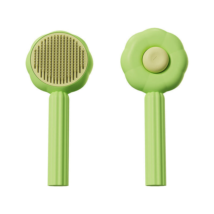 Hand holding the Self-Cleaning Pet Grooming Brush, demonstrating its comfortable grip and user-friendly design