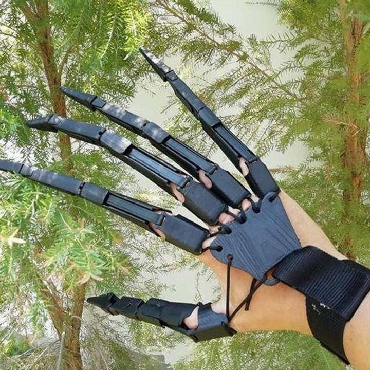 Unisex spooky articulated Halloween skeleton fingers, perfect for a horror costume