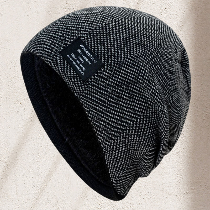 Unisex thermal knit beanie hat in forest green, laid flat to showcase its durable knit construction.