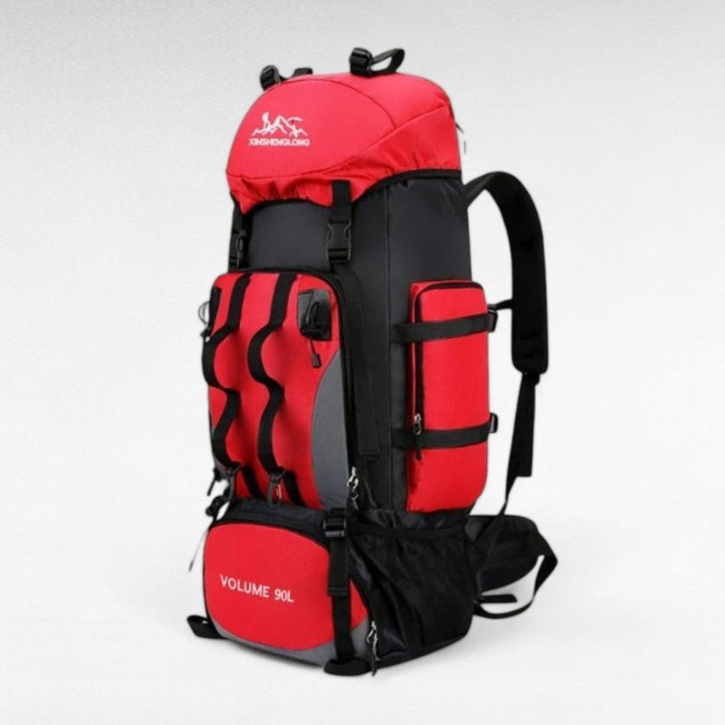 Hiker with 90L ultralight waterproof trekking backpack on trail. Essential outdoor adventure gear for travel.