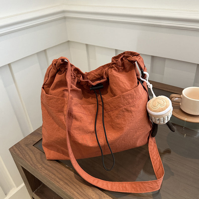 Casual black nylon messenger bag for unisex use, ultra-light and comfortable for all-day wear