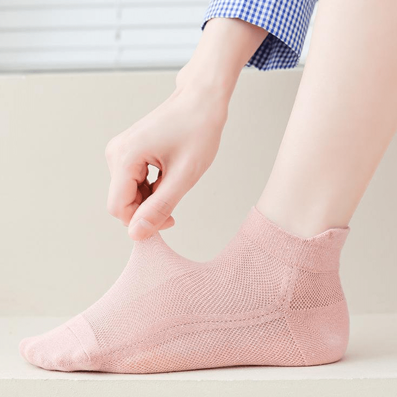 Pair of Unisex Ultra-Thin No-Show Socks in black, offering discreet, non-slip comfort.