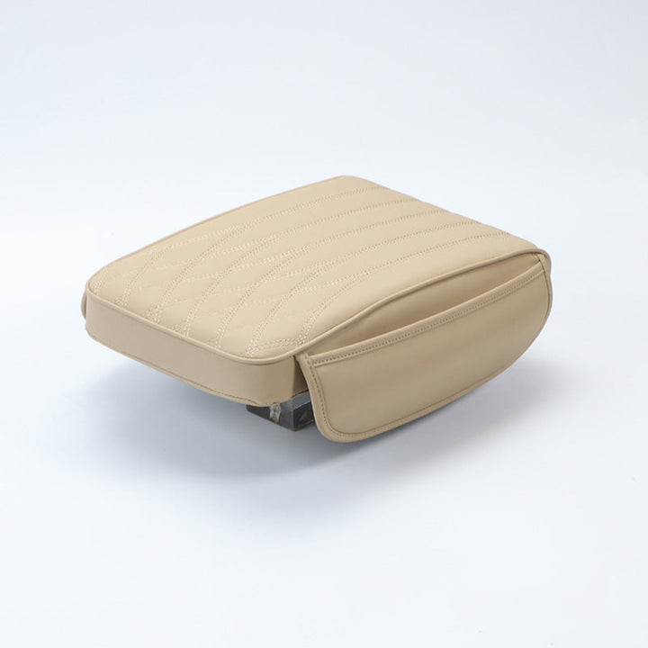 Packaged universal leather car armrest cushion, ready for installation and immediate car comfort.