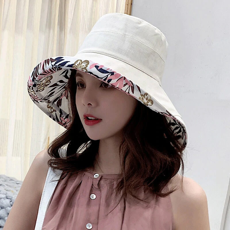 Stack of unisex wide brim cotton summer hats in various colors, ideal for outdoor accessories