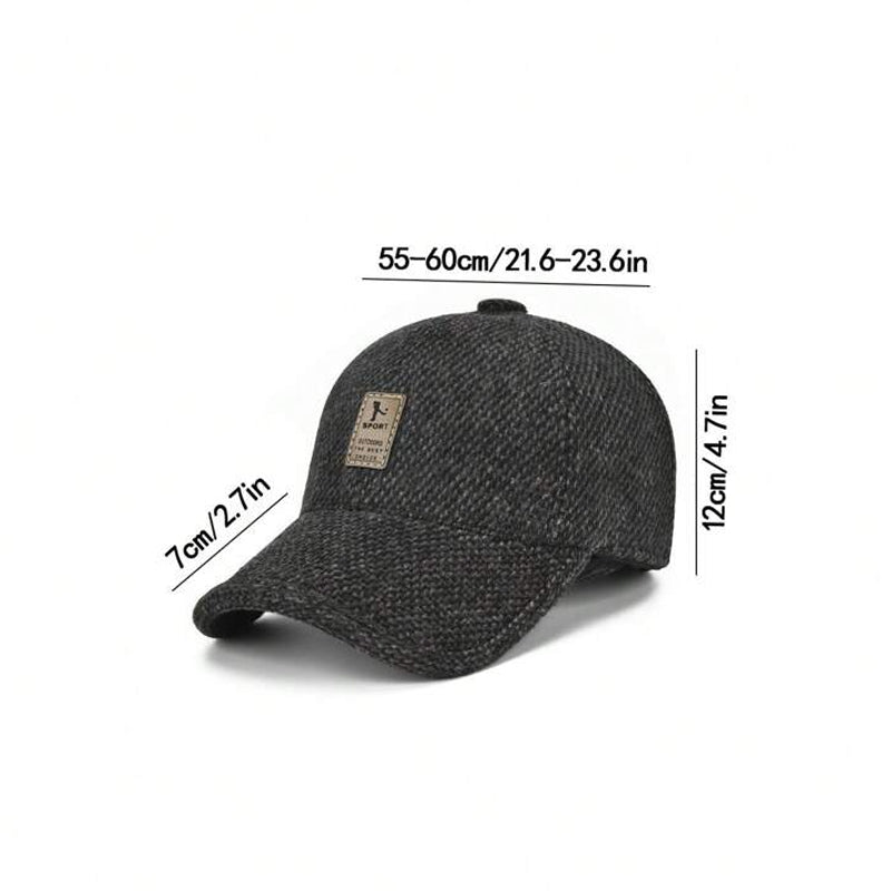 Unisex winter baseball cap, navy blue, with ear flaps partially unfolded, ready for changing weather