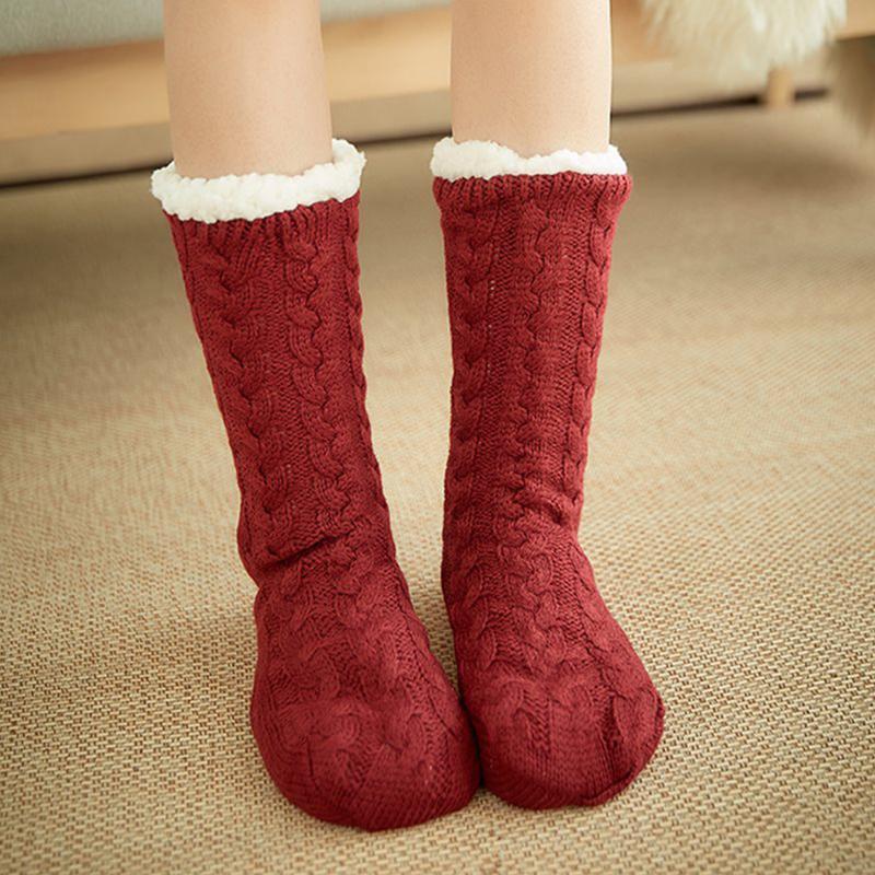 Soft knit unisex slipper socks, fleece-lined in pink, anti-slip design for comfort & safety.