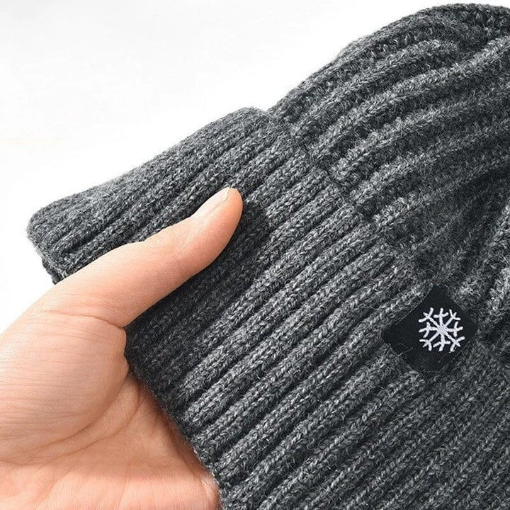 Close-up of the fleece lining inside the warm knit beanie hat, part of a unisex set
