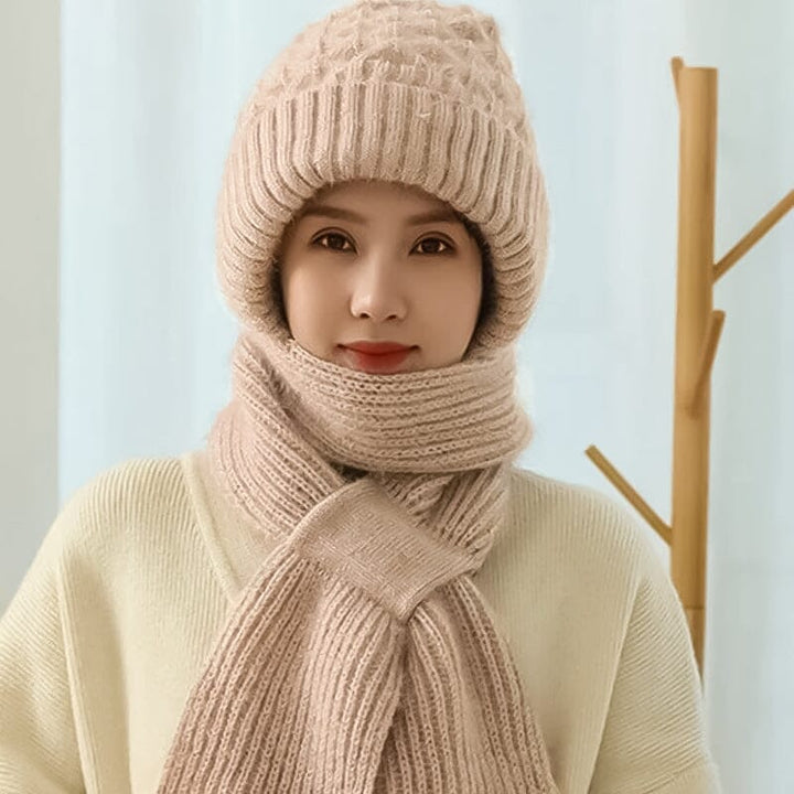 Folded warm knit hooded scarf, unisex, in a vibrant red, demonstrating its compact design and ear protection.