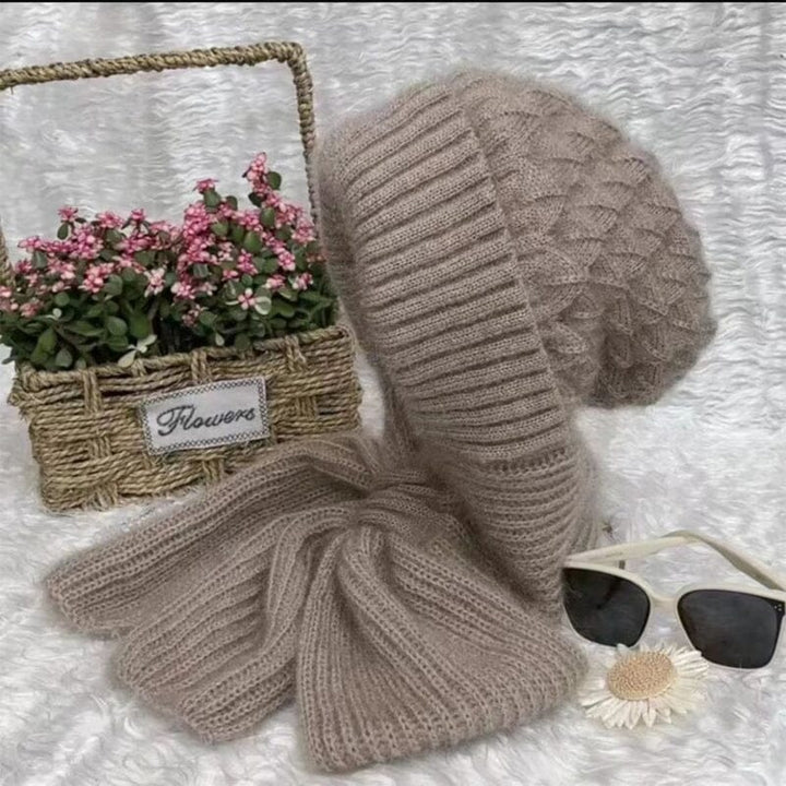 Unisex hooded scarf, knit, in a cozy oatmeal color, with ear protection, perfect for cold weather layering.