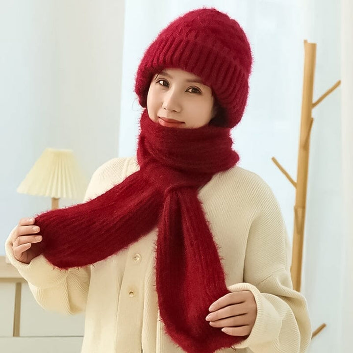 Textured image of a knit hooded scarf, unisex, highlighting its soft fabric and ear protection design for winter.