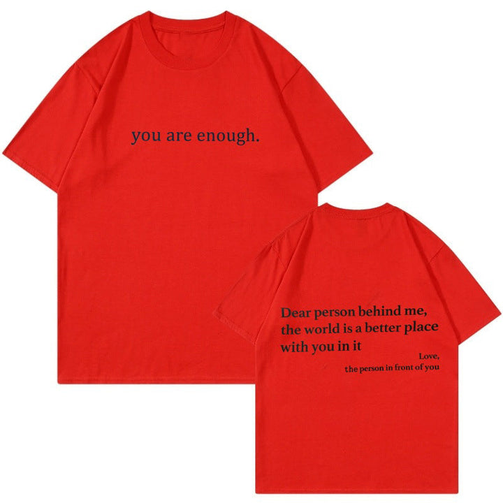 Close-up on the fabric of the 'You Are Enough' tee, highlighting its soft cotton texture.