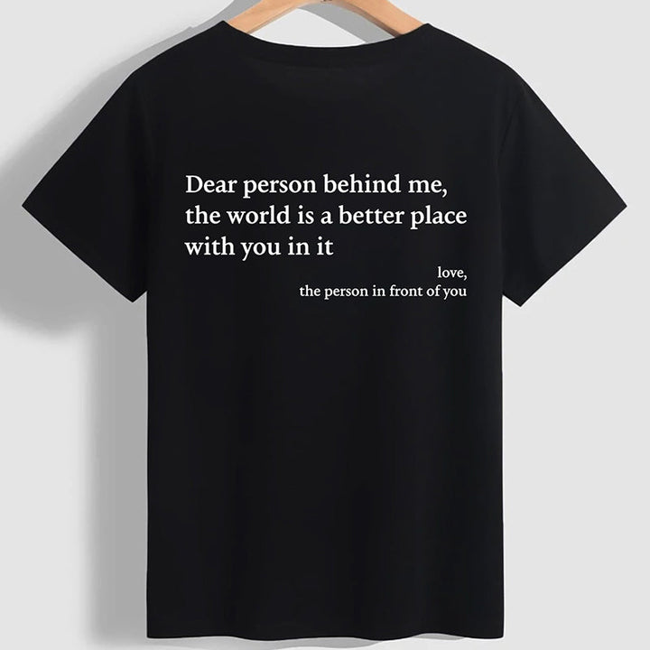 Unisex 'You Are Enough' comfort wear t-shirt in natural light, inviting and soft.