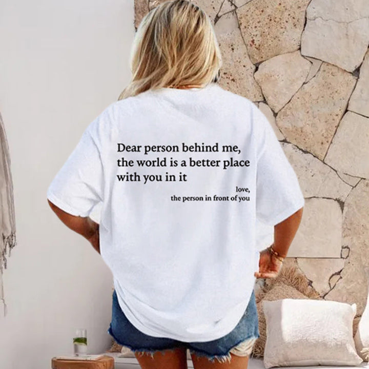 Close-up of 'You Are Enough' print on a soft cotton t-shirt, inspirational comfort wear.