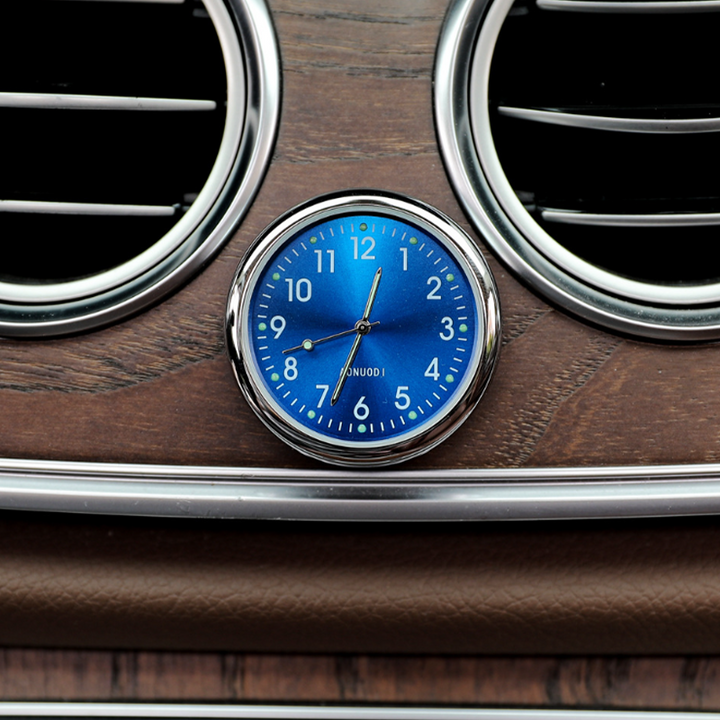 Universal car dashboard clock with luminous display, black casing, showing time clearly