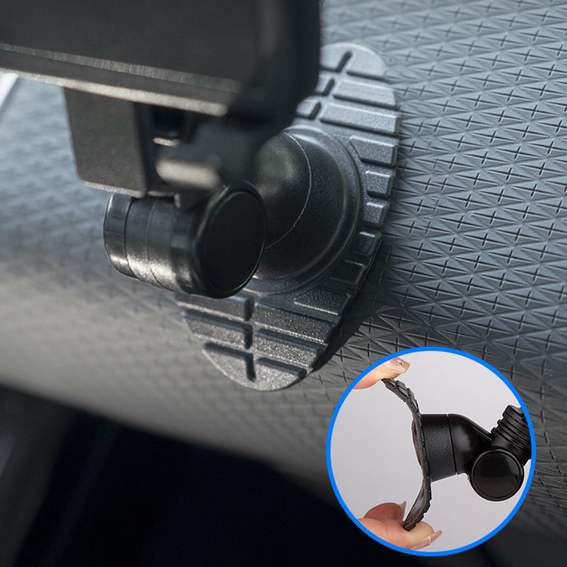 Car accessory: universal dashboard phone mount, black, perfect for navigation and calls in vehicle.