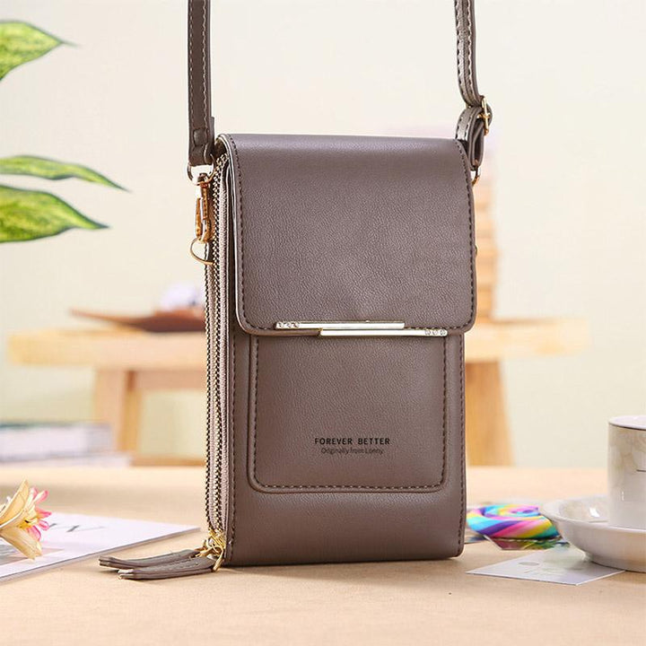 Stylish model wearing a universal crossbody phone case in brown PU leather, demonstrating hands-free convenience. Fashion accessory.
