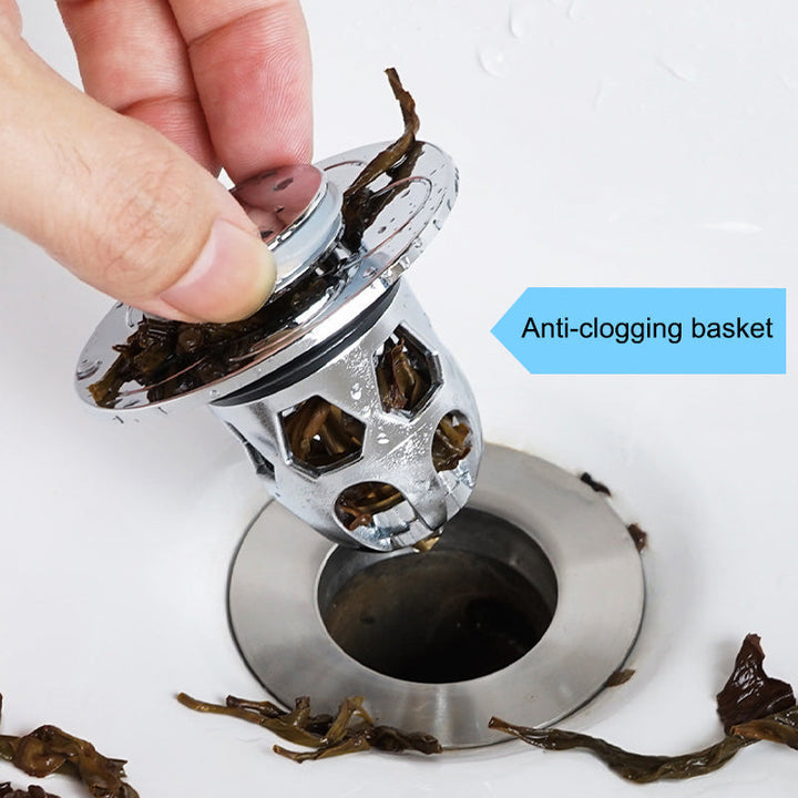 Kitchen sink with a Universal Pop-Up Sink Drain Stopper, acting as a drain filter for food particles