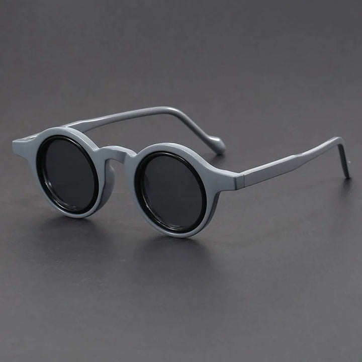 Velari unisex round frame sunglasses with matte black finish, a modern fashion accessory for all genders.