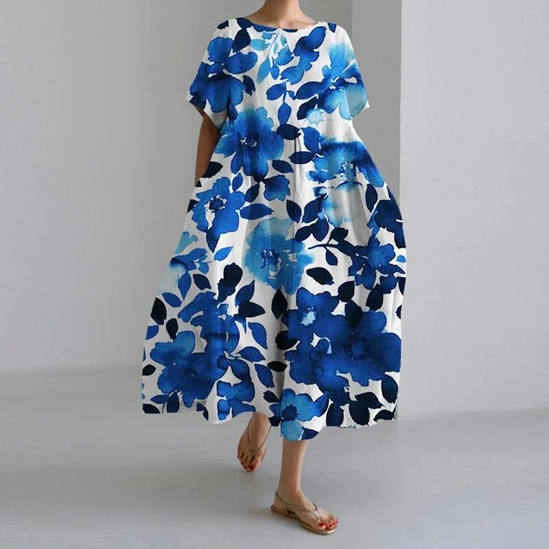 Vacation-perfect women's floral maxi dress, vibrant print for comfortable summer fashion.