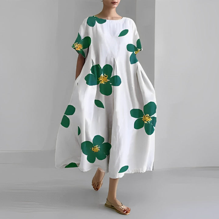 Elegant women's floral maxi dress with a colorful print, comfortable for all occasions.