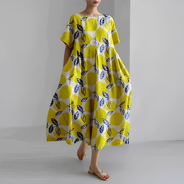 Women's maxi dress featuring a vibrant floral pattern, perfect for a chic spring look.