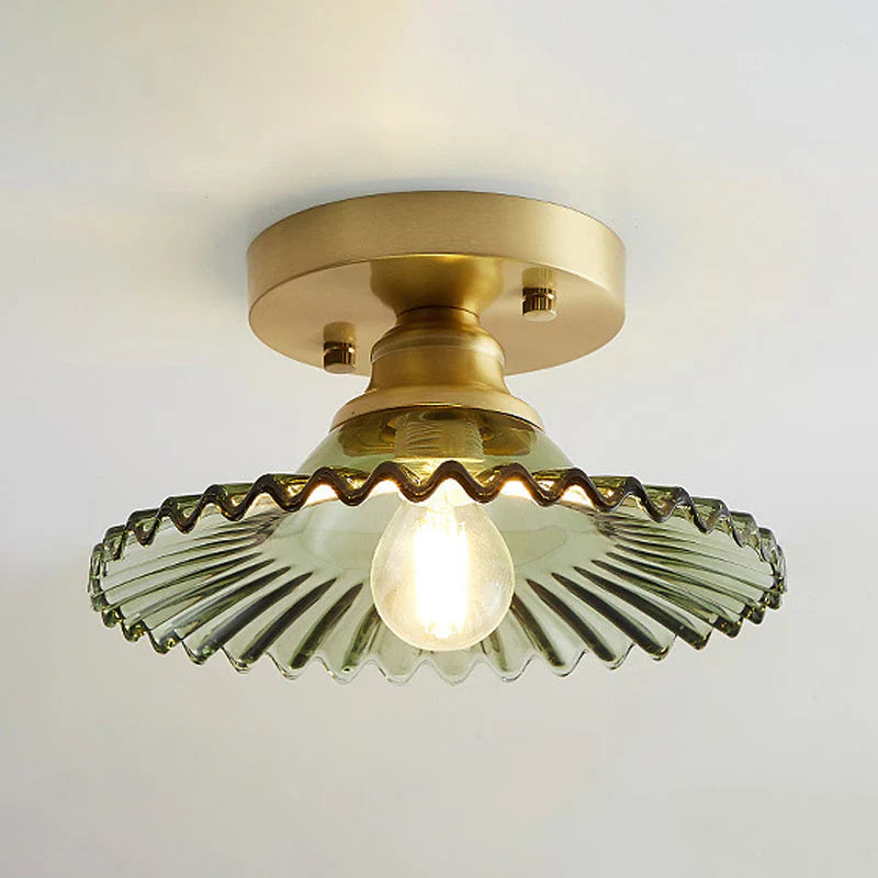 Vintage-inspired semi-flush ceiling lamp with ribbed green glass shade, ideal for classic or modern interiors.