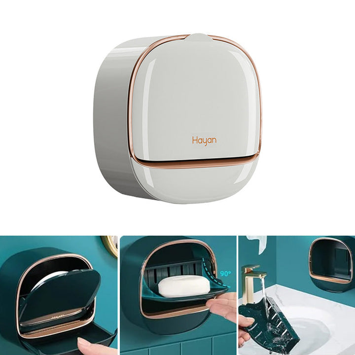 White ABS plastic self-draining soap dish, securely mounted on a bathroom wall for efficient soap drying.