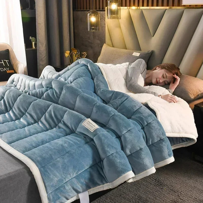 Soft coral fleece throw blanket, luxurious flannel feel. Cozy addition to any living room or bedroom decor.