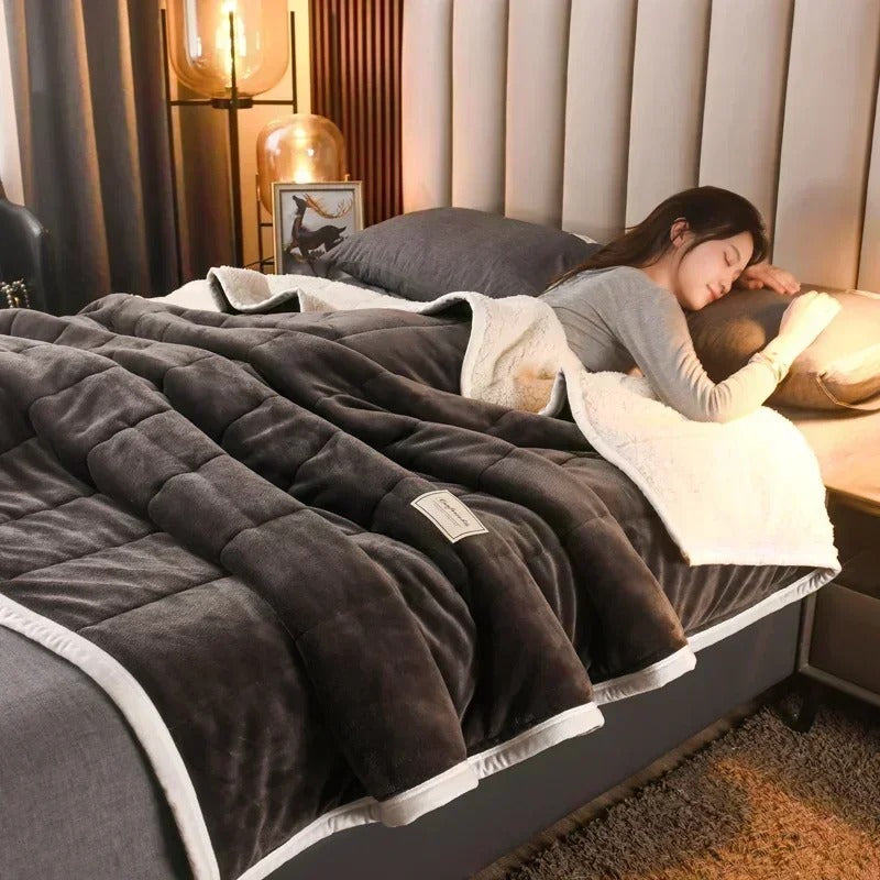 Ultra-soft coral fleece throw blanket, a warm & cozy gift for loved ones. Perfect for snuggling in winter.