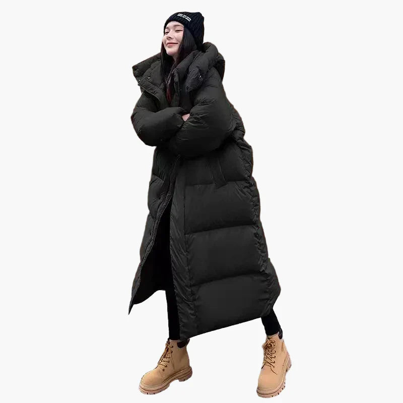 Stylish women's warm quilted puffer coat with hood and long length, suitable for winter